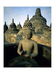 Buddha statue in front of a temple, Borobudur Temple, Java, Indonesia | Obraz na stenu