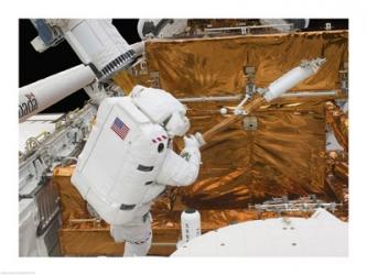 Astronaut works with the Hubble Space Telescope in the cargo bay of Atlantis | Obraz na stenu
