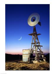 Industrial windmill at night, California, USA | Obraz na stenu