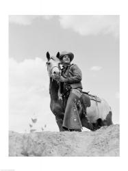 Cowboy on top of escarpment | Obraz na stenu