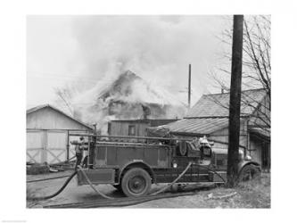 Fire engine next to home in fire | Obraz na stenu