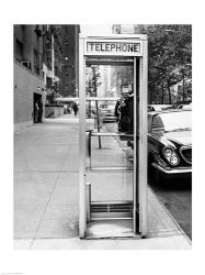 Car parked at the side of a road near a telephone booth | Obraz na stenu