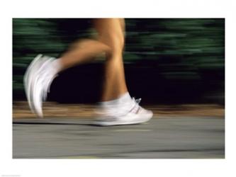 Low section view of a person running | Obraz na stenu