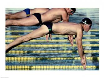 Side profile of three swimmers jumping into a swimming pool | Obraz na stenu
