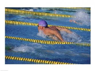 Swimmer racing in a swimming pool | Obraz na stenu