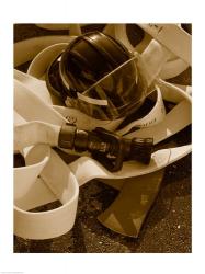 Close-up of a firefighter's helmet on a fire hose | Obraz na stenu