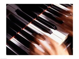 Close-up of a person's hands playing a piano | Obraz na stenu