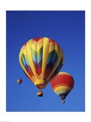 Low angle view of hot air balloons rising, Albuquerque International Balloon Fiesta, Albuquerque, New Mexico, USA | Obraz na stenu