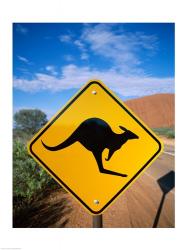 Kangaroo sign on a road with a rock formation in the background, Ayers Rock | Obraz na stenu