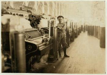 Boy sweeper by carding machines at Lincoln Cotton Mills, Evansville, Indiana in stockinged feet on a slippery floor, 1908 (b/w photo) | Obraz na stenu