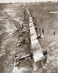 A British bombing squadron drawn up at St. Omer, France during World War I. From The Story of 25 Eventful Years in Pictures, published 1935. | Obraz na stenu