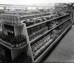 Paint and brushes aisle, Woolworths store, 1956 (b/w photo) | Obraz na stenu