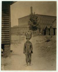 12 year old Eddie Norton, makes about 40 cents a day as a sweeper at Saxon Mill, Spartanburg, North Carolina, 1912 (b/w photo) | Obraz na stenu