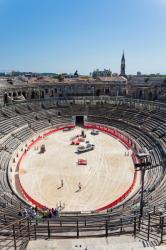 Nimes, Gard Department, Languedoc-Roussillon, France. Interior of the Roman amphitheatre. The amphitheatre is used for various events. Here it is being prepared for a bullfight. | Obraz na stenu