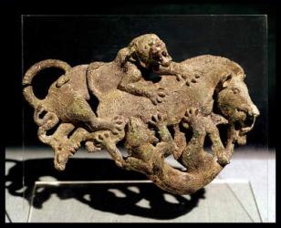 Ornamental plaque depicting a wild boar struggling with two tigers, from Tomb 3 at Shih-chai-shan, Yunnan Province, Western Han Dynasty, 2nd-1st century BC (bronze) | Obraz na stenu