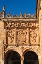 Salamanca, Salamanca Province, Spain. University. Imperial shields above the entrance to the Courtyard of the Escuelas Menores. The centre shield is that of Carlos V. | Obraz na stenu