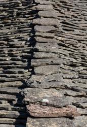Gjirokastra or Gjirokaster, Albania. Typical stone roofs in the old town. Gjirokastra is a UNESCO World Heritage Site. (photo) | Obraz na stenu