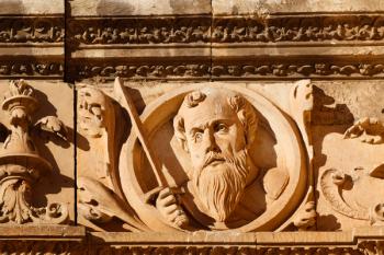 Salamanca, Salamanca Province, Spain. University. Medallion of St Paul above the entrance to the courtyard of the Escuelas Menores. | Obraz na stenu