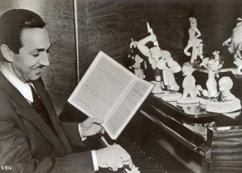 Walt Disney plays piano to a group of figures of Disney characters, c.1940 (b/w photo) | Obraz na stenu