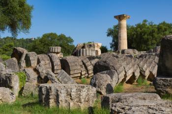 Olympia, Peloponnese, Greece. Ancient Olympia. Ruins of the 5th century BC Doric order Temple of Zeus. Ancient Olympia is a UNESCO World Heritage Site. (photo) | Obraz na stenu