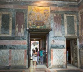 Istanbul, Turkey. Byzantine Church of St. Saviour in Chora. Visitor entering the Nave. Above her the mosaic showing The Dormition of the Virgin. The death of the Virgin Mary. | Obraz na stenu