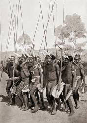 An avenging expedition by a northern tribe of Central Australia. The men danced just before leaving to take vengeance on another group of natives for the death of a relative. Whenever a death occurred it was believed to be due to magic, and it was the dut | Obraz na stenu