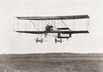 Henri Farman winning the Grand Prix of two thousand pounds for the longest flight of 112 miles in a Farman III Biplane at The Grande Semaine d'Aviation de la Champagne, Reims, France in 1909. Henri Farman, 1874 – 1958. French pilot, aviator and aircraft d | Obraz na stenu