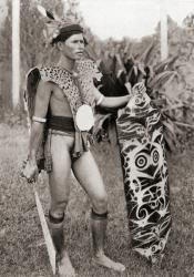 A native of Borneo in war costume. After a 19th century photograph. From Customs of The World, published c.1913. | Obraz na stenu