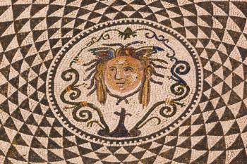 Carmona, Seville Province, Spain. Roman mosaic of Medusa in Town Hall. | Obraz na stenu