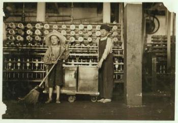 12 year old doffer Ronald Webb and 7 year old Frank Robinson, son of cardroom boss, who sweeps and doffs (clears full bobbins) at Roanoke Cotton Mills, Virginia, 1911 (b/w photo) | Obraz na stenu