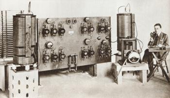 Radio announcer transmitting a news bulletin in 1920. From The Story of 25 Eventful Years in Pictures, published 1935. | Obraz na stenu
