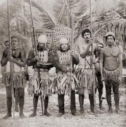 Warriors from The Gilbert Islands, Pacific Ocean. The Gilbert Islanders invented armour of coconut fibre to protect themselves against spears furnished with shark's teeth. After a 19th century photograph. From Customs of The World, published c.1913. | Obraz na stenu
