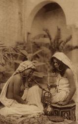 Harem girls smoking a hookah, from an early 20th century postcard (sepia photo) | Obraz na stenu
