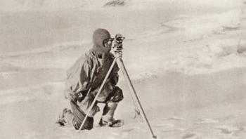 Captain Evans observing with the theodolite used by Captain Scott to fix position of the South Pole, from 'South With Scott' by E.R.G.R. Evans (b/w photo) | Obraz na stenu