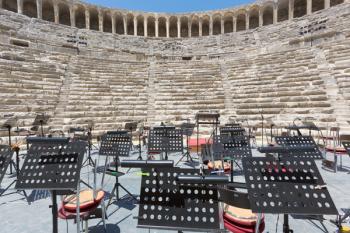 Aspendos, Antalaya Province, Turkey. The Roman theatre which is still in use. Orchestral equipment on stage in preparation for a performance. | Obraz na stenu