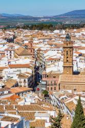Antequera, Malaga Province, Andalusia, southern Spain. Looking down from La Alcazaba, (the citadel or castle) into the city. The church on the right, closest to the camera, is the Real Colegiata de San Sebastián (Collegiate Church of Saint Sebastian) dati | Obraz na stenu